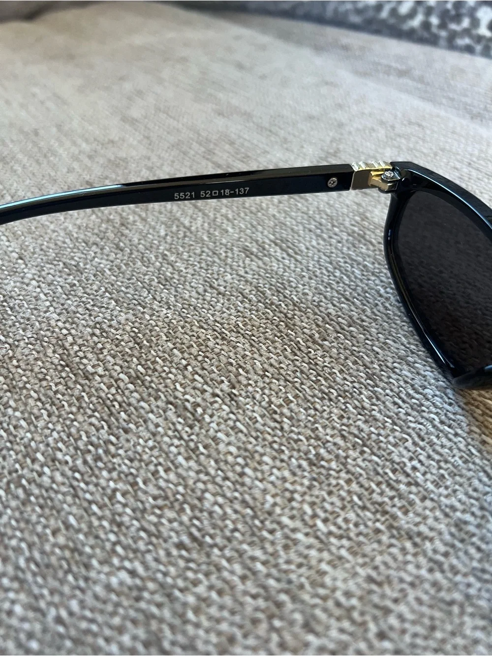 Miu Miu Black Sunglasses with Gold Accent - Classic Cat-Eye Style